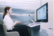 Customer receiving remote financial consultation using Hyosung TNS’s world-first digital kiosk solution, Digital Desk®